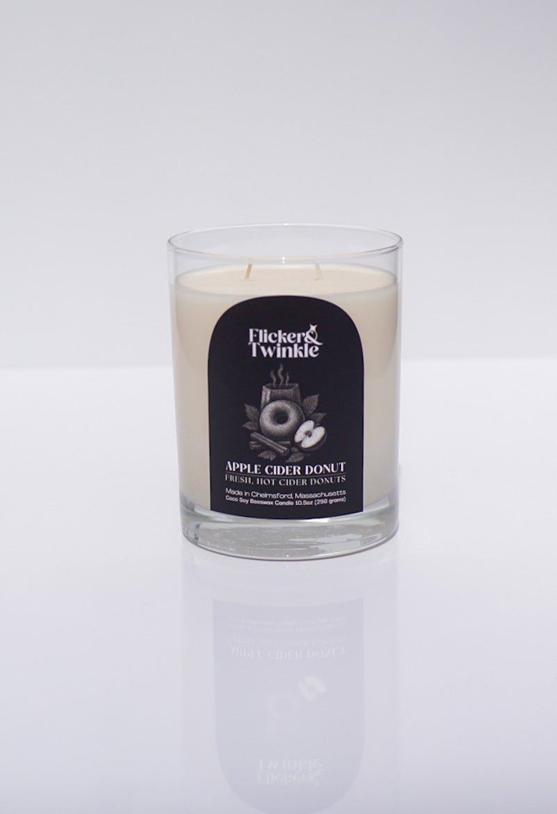 A luxury Apple Cider Donut Coconut Wax Candle on a white background.