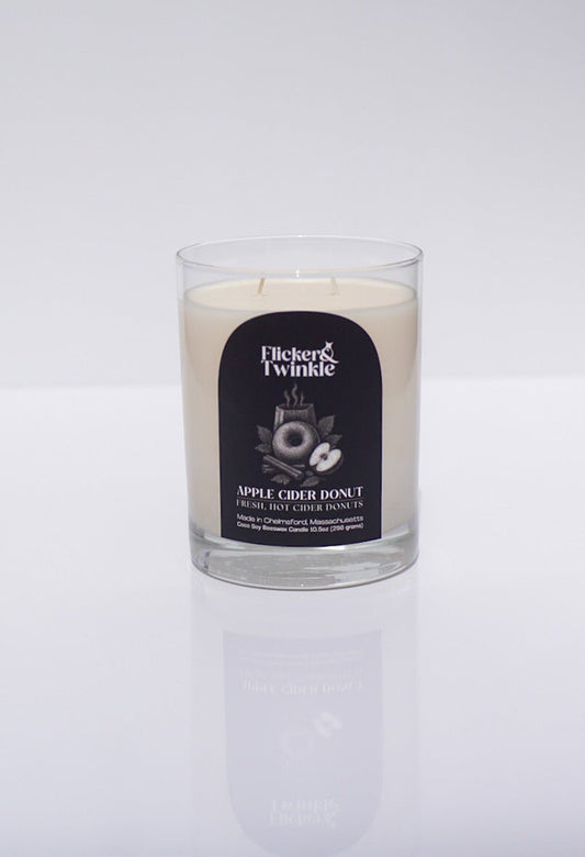 A luxury Apple Cider Donut Coconut Wax Candle on a white background.