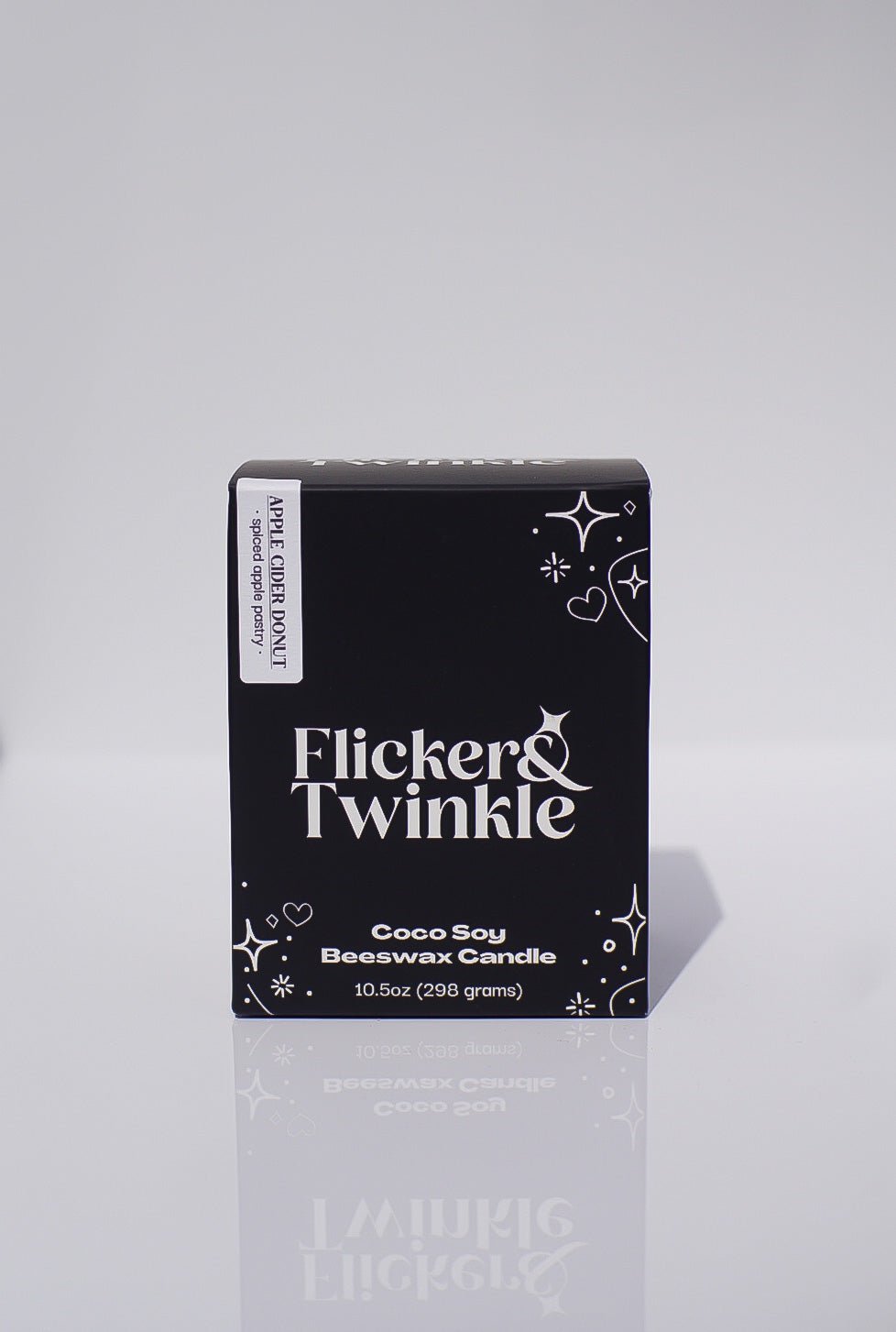 Black Flicker & Twinkle box for Apple Cider Donut Coconut Wax Candle with star designs.