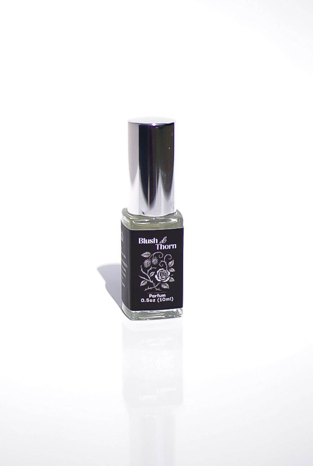 Small bottle with a black label on a white background