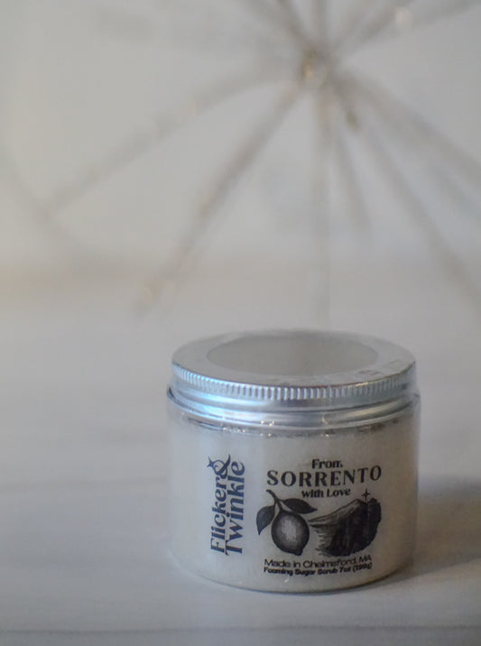 Lemon and Citrus Scented Foaming Sugar Scrub on a white neutral background