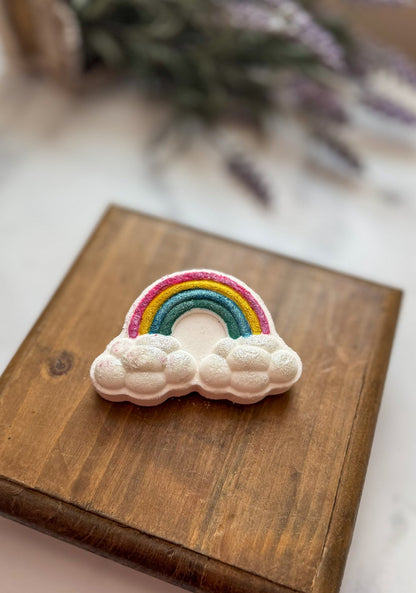 Rainbow and clouds on wood, inspired by our Rainbow Splash Bath Bomb.