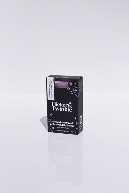 A black Lavender Santal Goats Milk Soap box with purple soap visible inside.