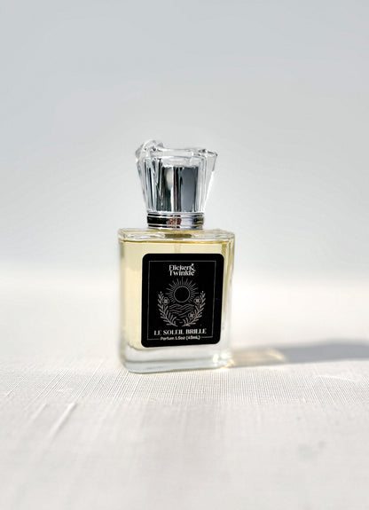 le Soleil Brille Perfume bottle with a black label on a white background