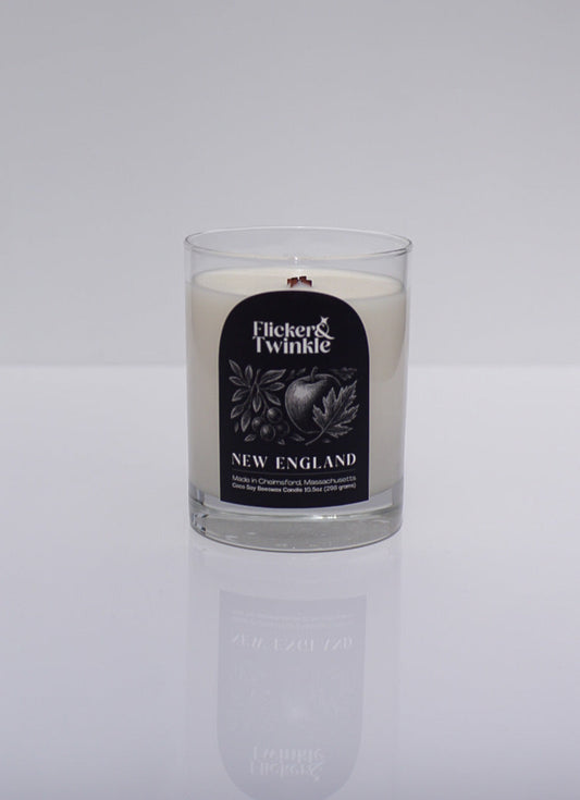 New England Scented Candle with a label on a white background