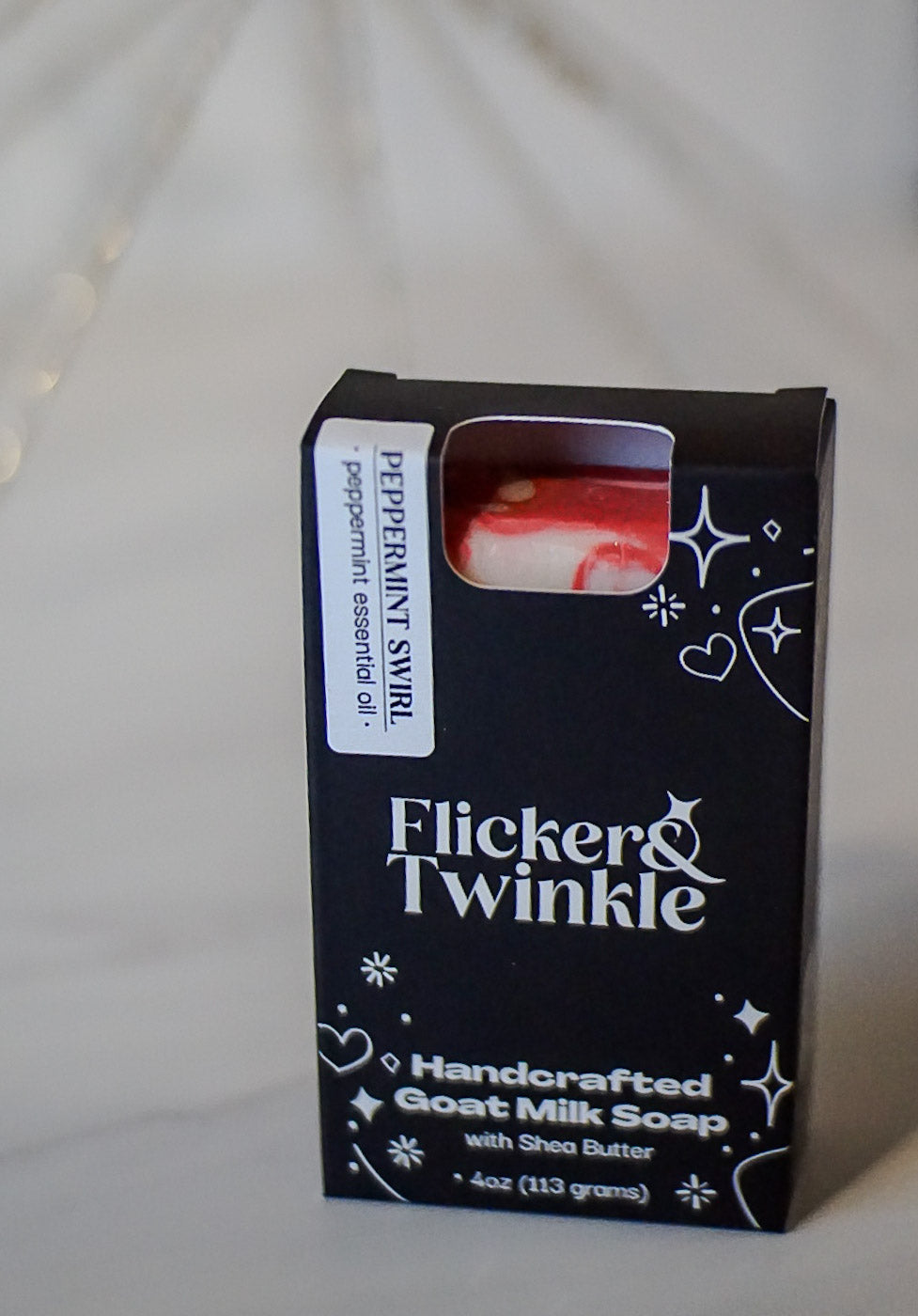 Flicker & Twinkle handcrafted Peppermint goat milk soap packaging on a white background