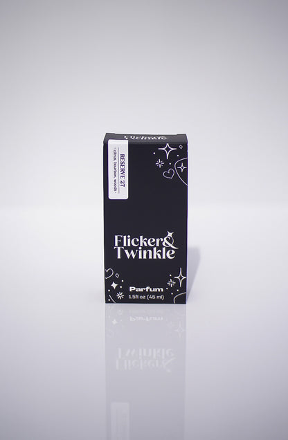 Flicker & Twinkle perfume box on a light gray background