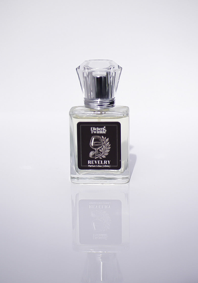 Perfume bottle labeled 'Revelry' on a white background