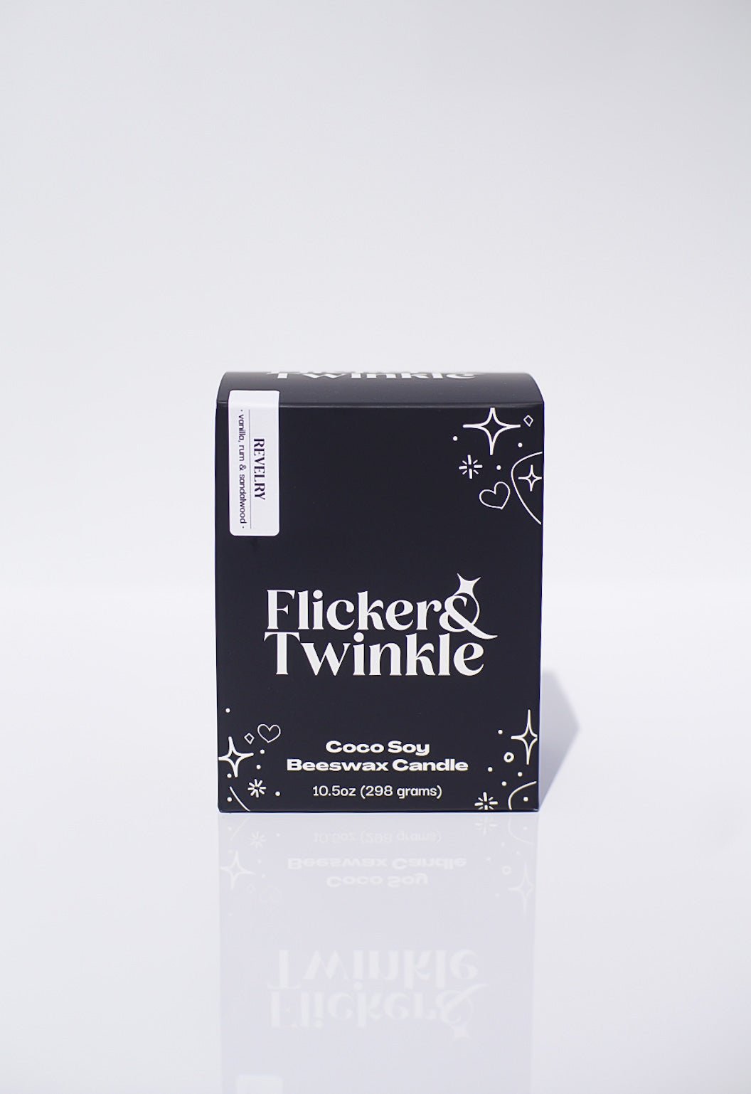 Black box labeled Revelry Coconut Wax Candle, 10.5oz, on white background.