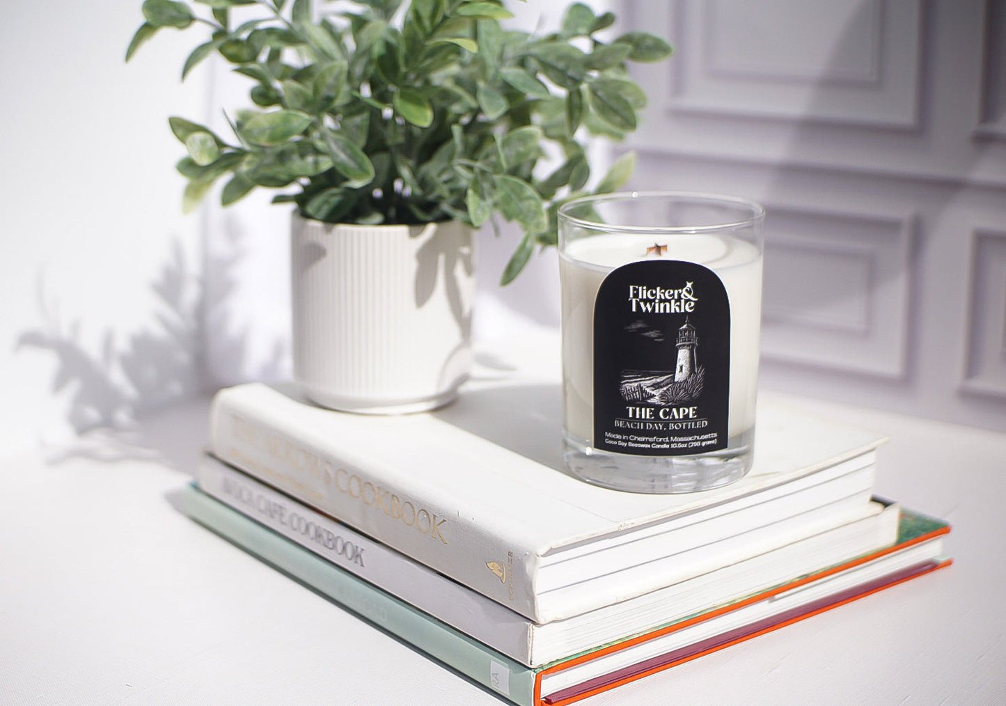 The Cape Candle—Coconut Soy Beeswax by Flicker And Twinkle, with its ocean scent with a crackling wood wick