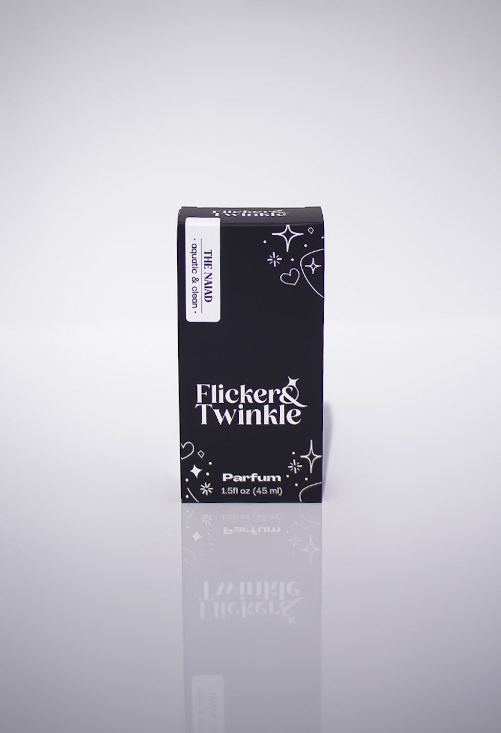 Flicker & Twinkle perfume packaging on a light gray background