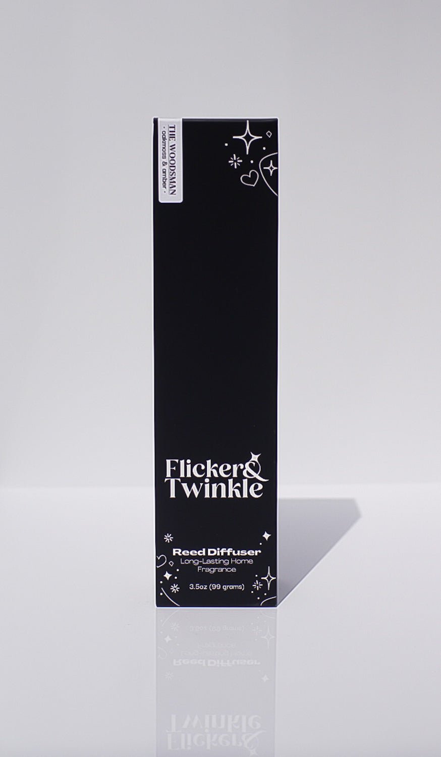 A black rectangular box labeled The Woodsman Reed Diffuser with white graphics.