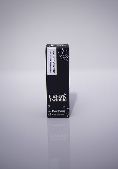 Vanille Enchantée Perfume, a gourmand scent, stands upright on a reflective surface.