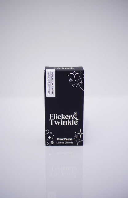 A black Vanille Enchantée Perfume box, 1.58 oz, with white text and stars.