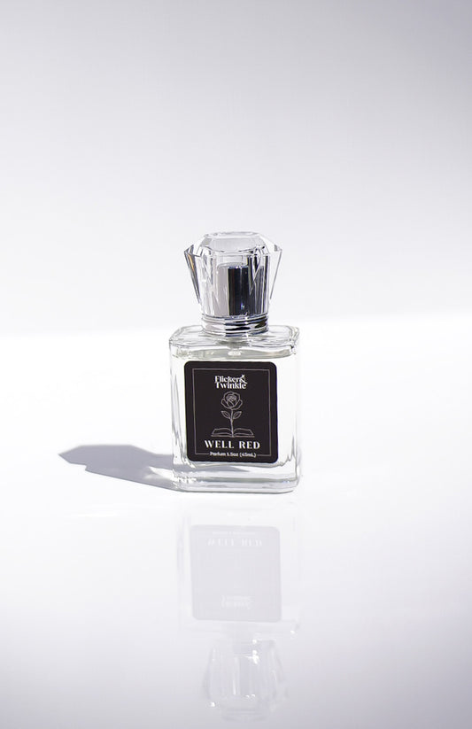 Perfume bottle labeled 'Well Red' on a white background